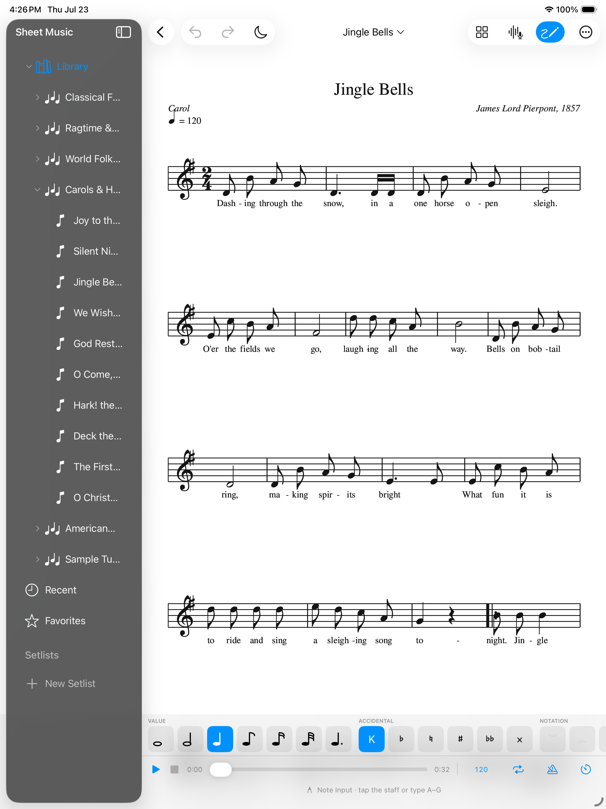 The editor on iPad &mdash; Jingle Bells engraved across four systems with its lyrics, the library sidebar open on Carols & Hymns, and a note-entry palette along the bottom offering note values from whole to thirty-second with dots, accidentals from flat and natural to sharp, double flat and double sharp, and ties and slurs, with playback at 120 bpm