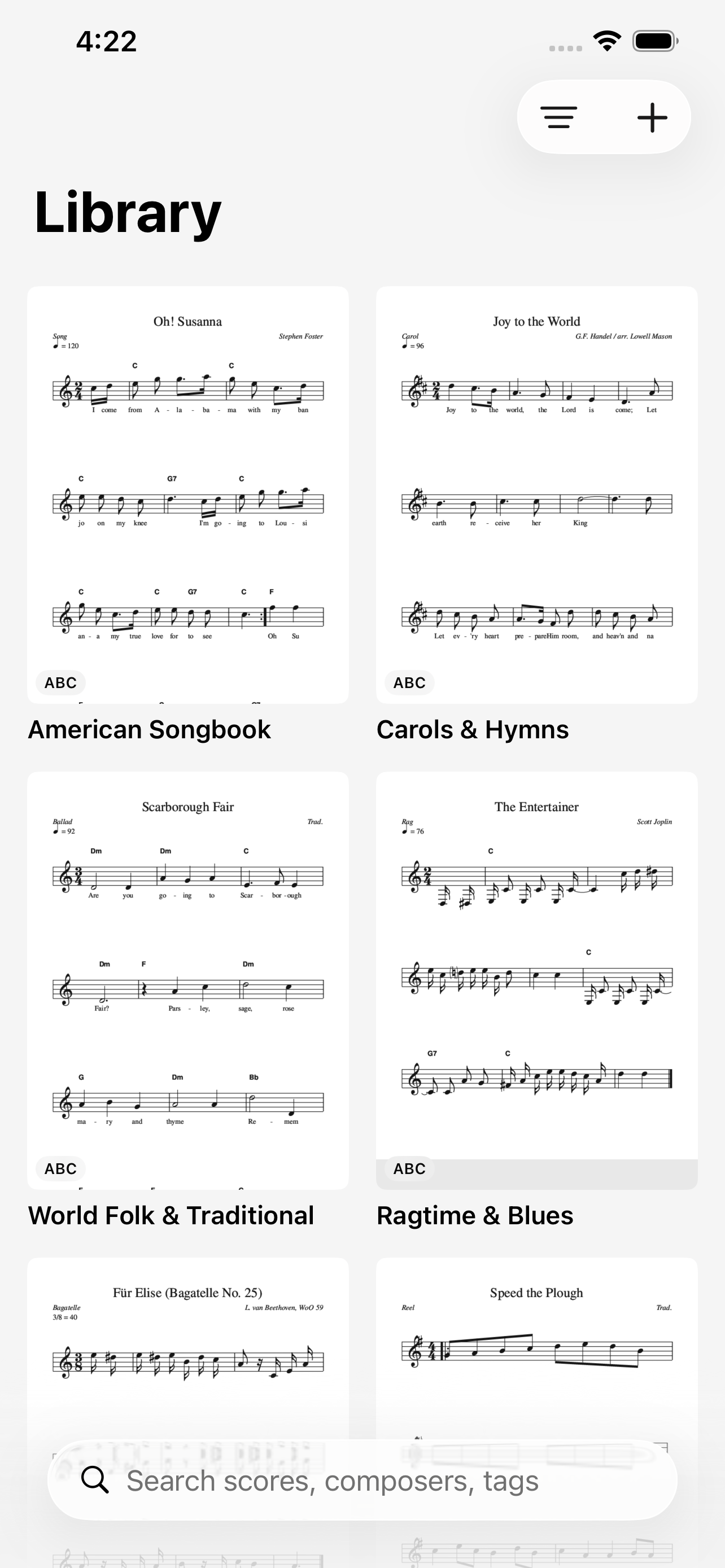 The library on iPhone &mdash; collections shown as engraved first pages: the American Songbook opening on Oh! Susanna, Carols & Hymns on Joy to the World, World Folk & Traditional on Scarborough Fair, Ragtime & Blues on The Entertainer, then F&uuml;r Elise and Speed the Plough, each tagged ABC, over a field to search scores, composers and tags